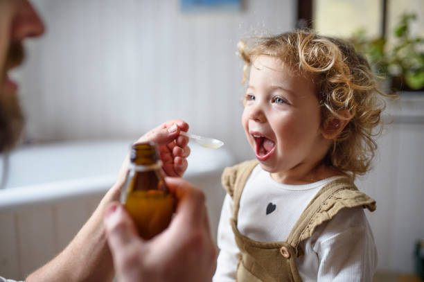 Girl taking medicine