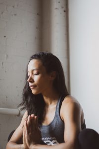 mindfulness practice woman in yogic pose