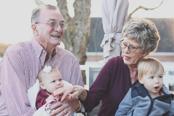 senior couple with grandchildren