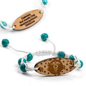 white and teal medical bracelet with wooden engraved tag